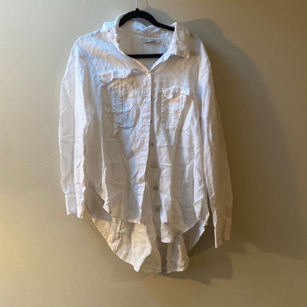 White button up, soft surroundings, medium